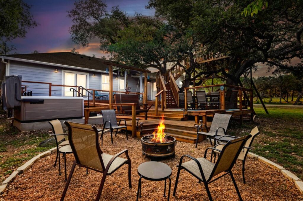 Fire pit and deck at Hill Country Treehouse vacation rental in Canyon Lake, Texas Hill Country.